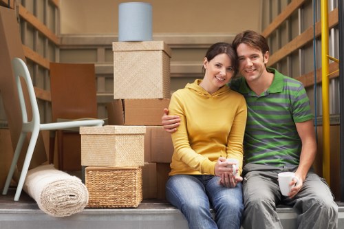 Professional movers handling a flat removal in Wimbledon